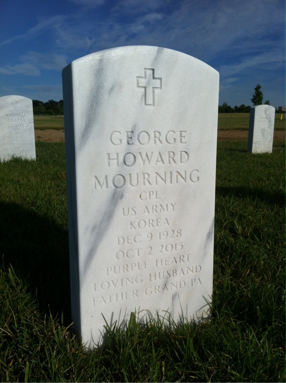 Headstone shared by 2 interments, including George Howard Mourning