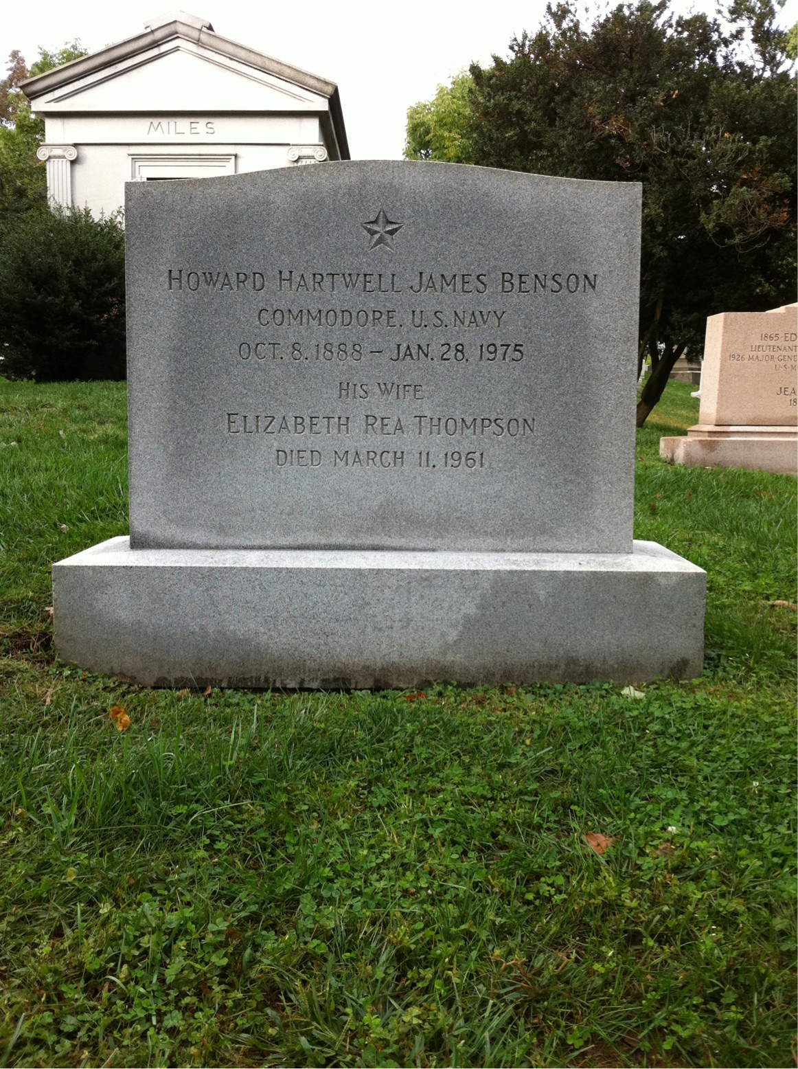 Headstone shared by 2 interments, including Howard H Benson