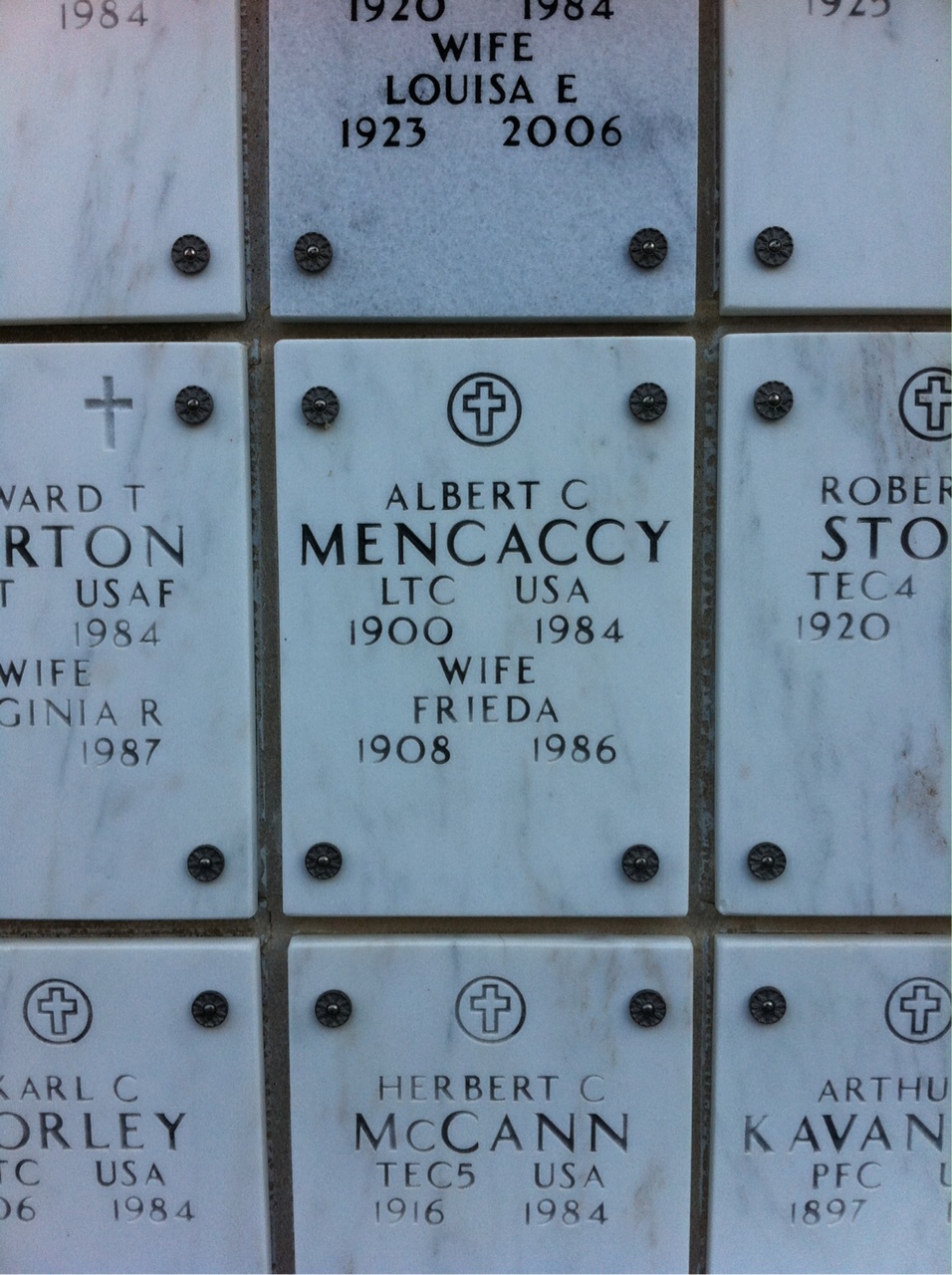 Headstone shared by 2 interments, including Albert C Mencaccy