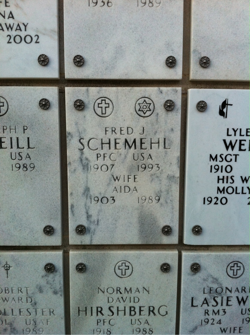 Headstone shared by 2 interments, including Aida Schemehl
