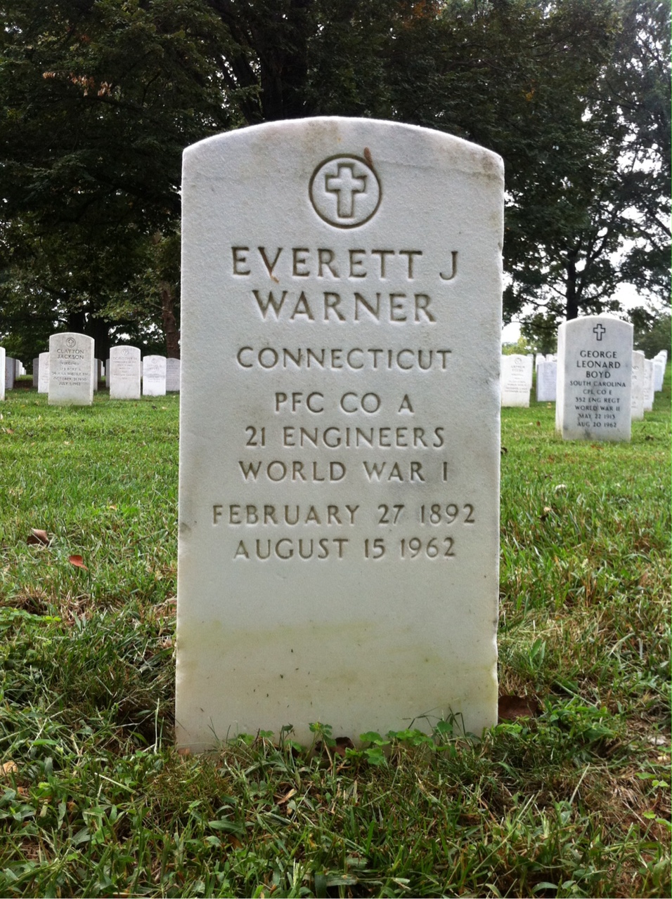 Headstone shared by 2 interments, including Everett J Warner