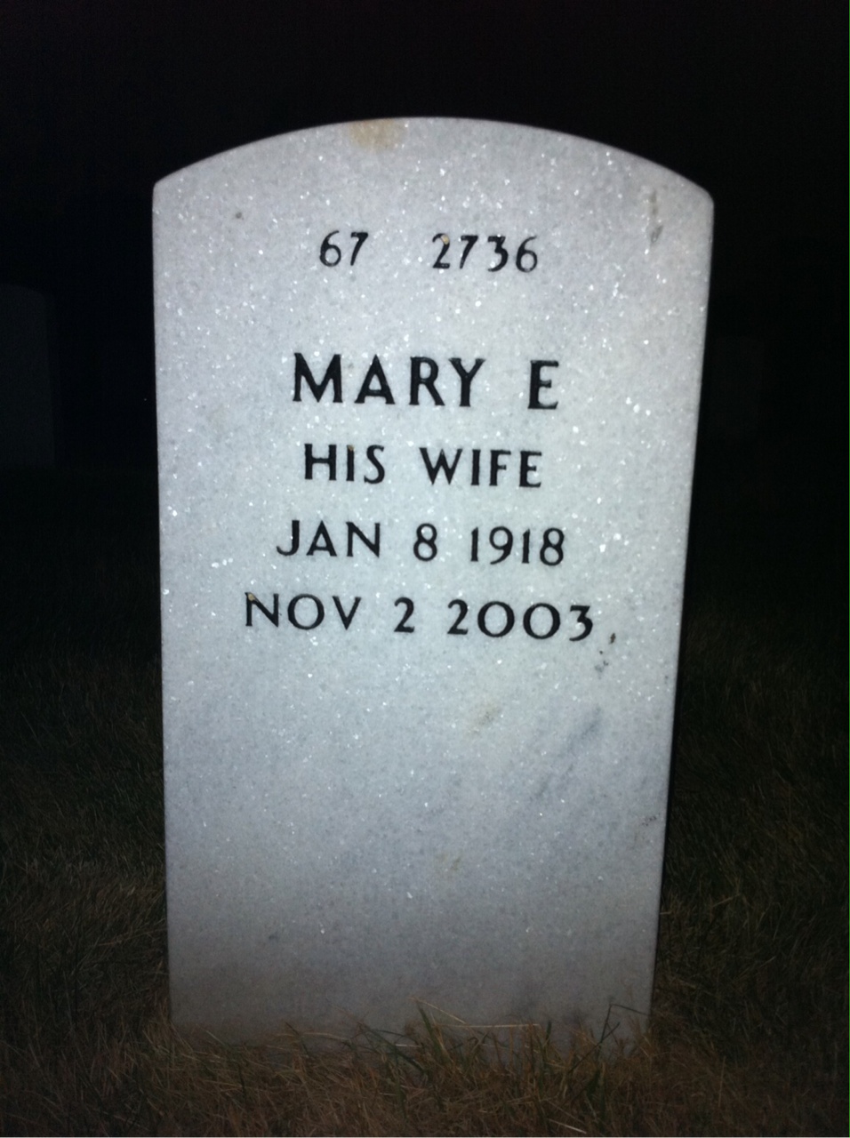Headstone shared by 2 interments, including Roger Eugene Michael