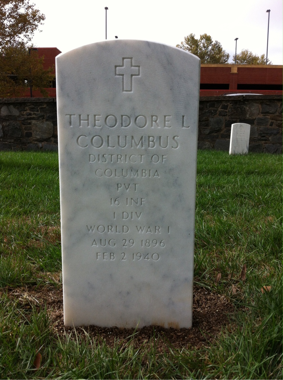Headstone shared by 2 interments, including Julian I Columbus