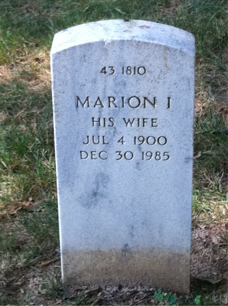 Headstone shared by 2 interments, including Marion I Yates