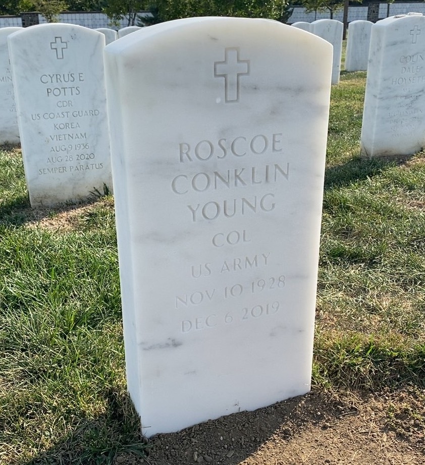 Headstone shared by 2 interments, including Roscoe Conklin Young