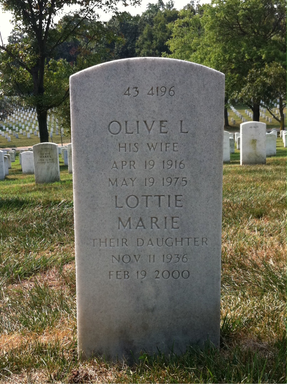 Headstone shared by 3 interments, including Lottie M Alexander