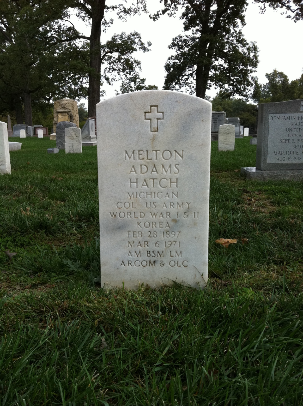 Headstone shared by 2 interments, including Melton Adams Hatch