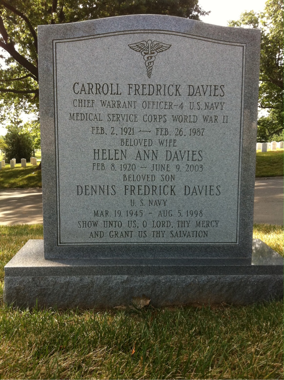 Headstone shared by 3 interments, including Dennis F Davies