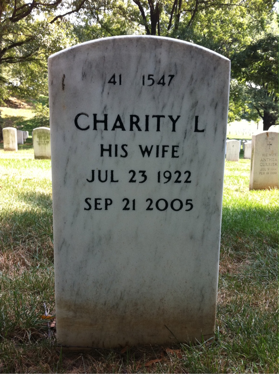 Headstone shared by 2 interments, including John R Smith Jr.