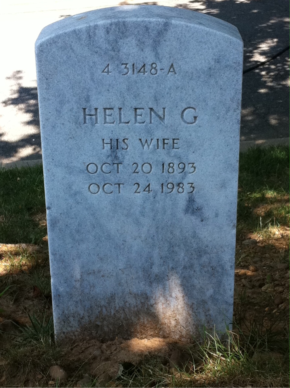 Headstone shared by 2 interments, including Helen G Schmidt