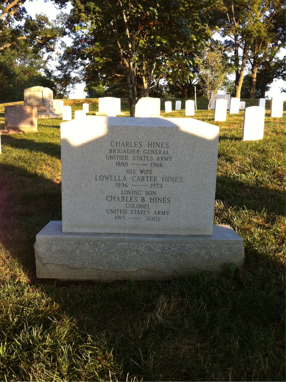 Headstone shared by 3 interments, including Lowella C Hines