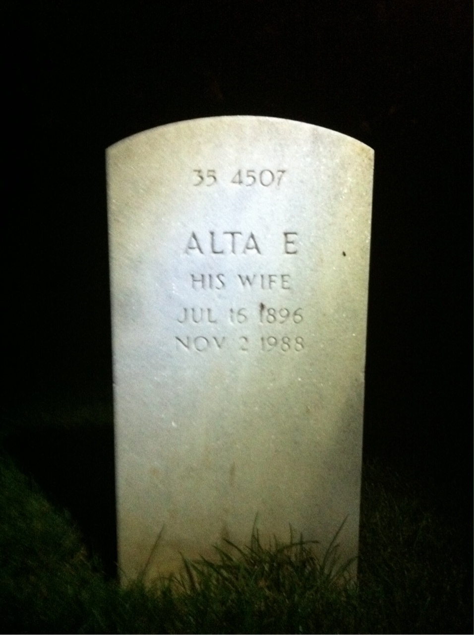 Headstone shared by 2 interments, including Alta E Walden