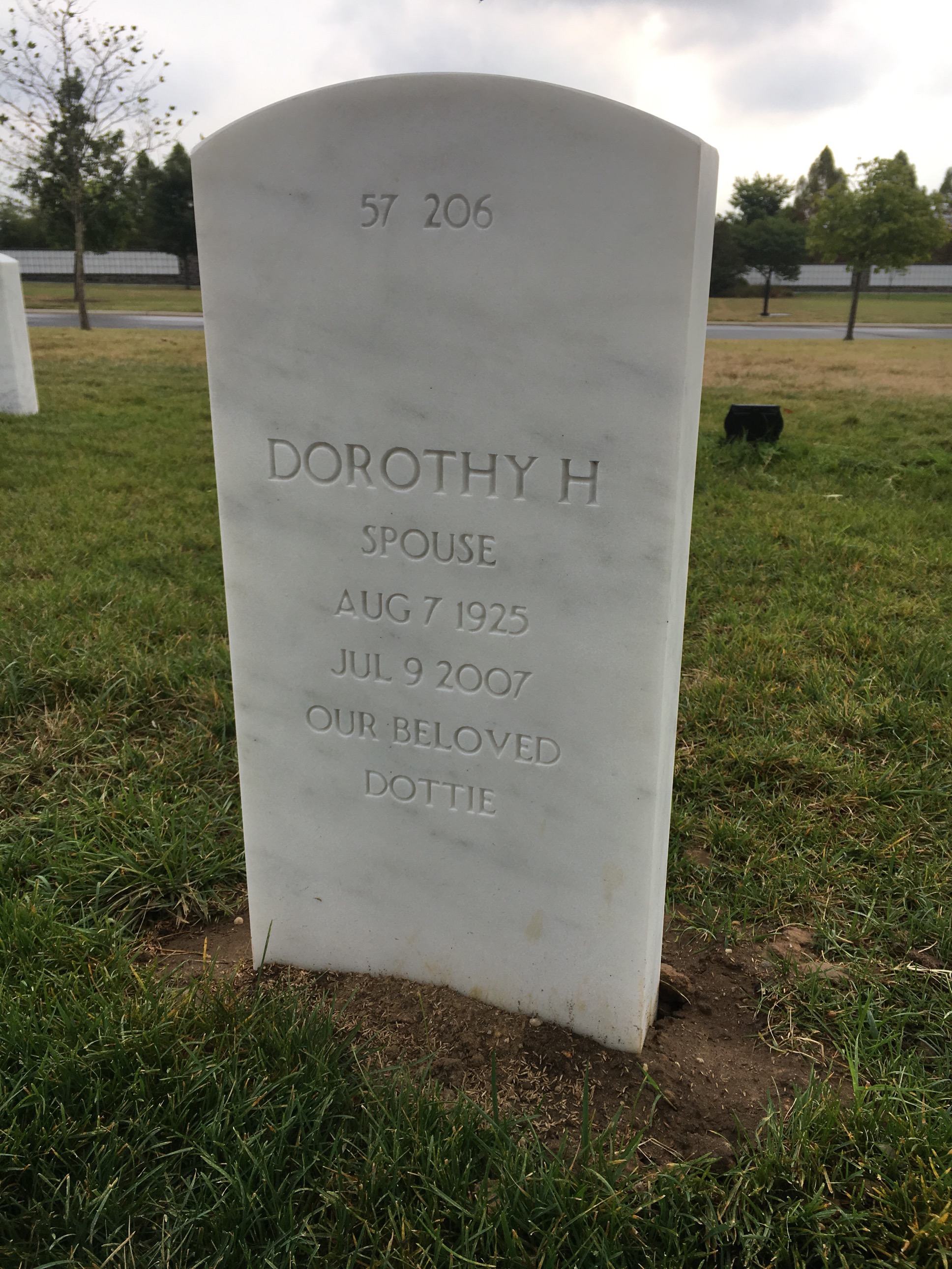 Headstone shared by 2 interments, including Cecil Olson Kincer