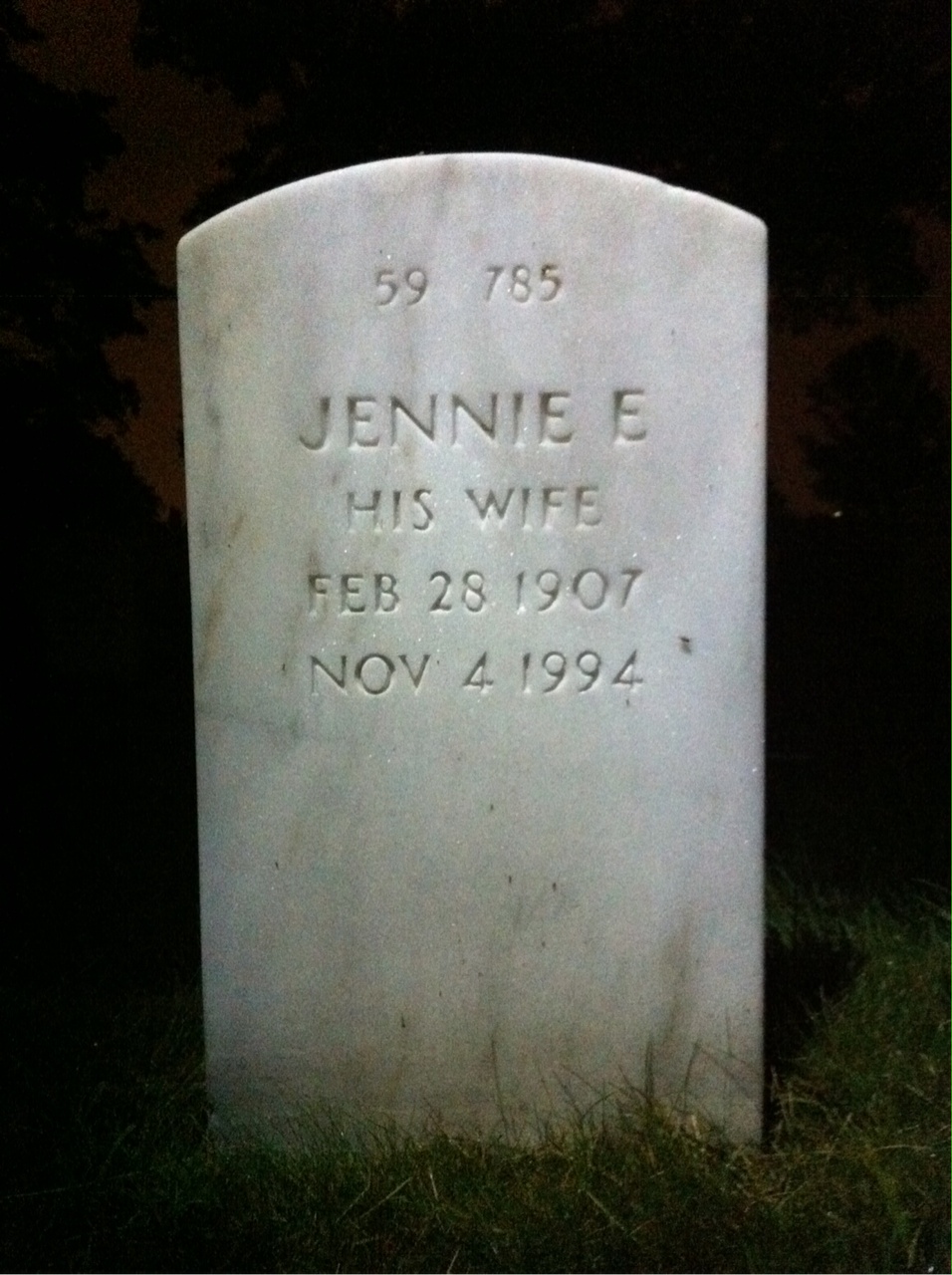 Headstone shared by 2 interments, including Conrad M Fisher