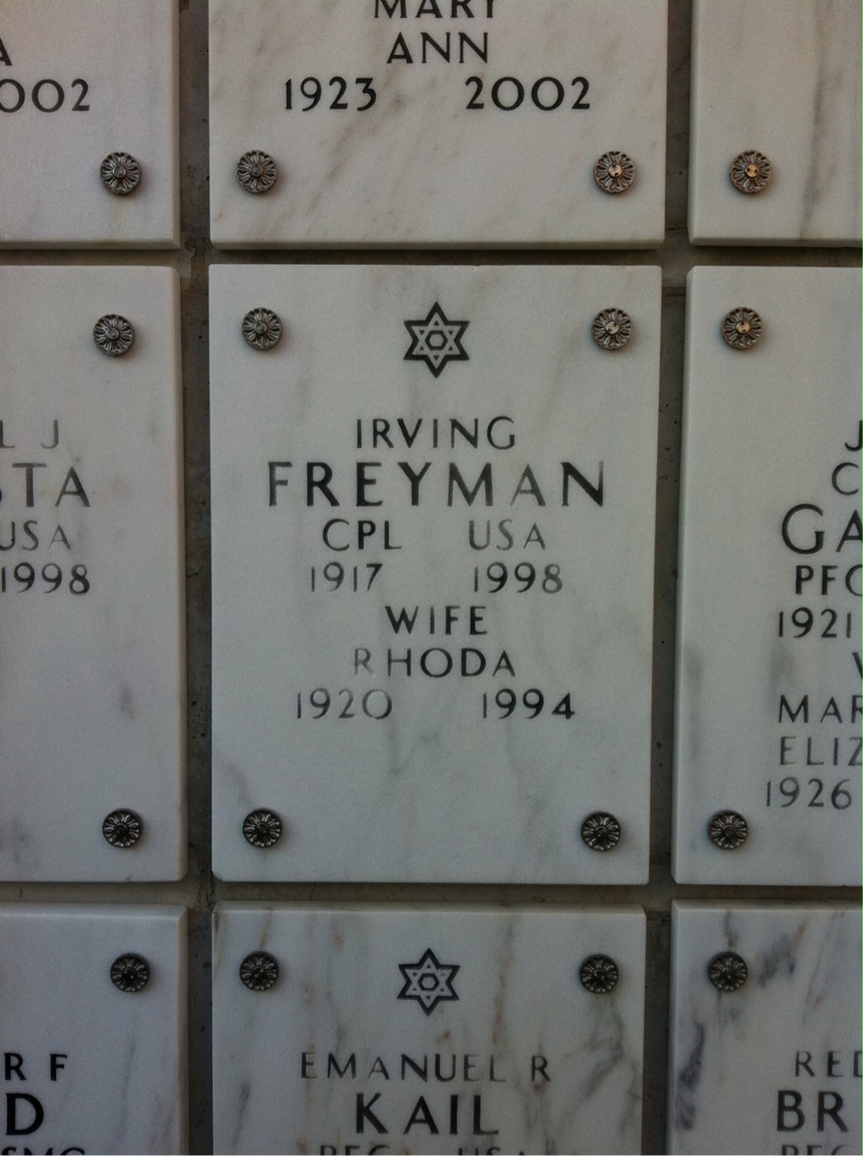 Headstone shared by 2 interments, including Irving Freyman