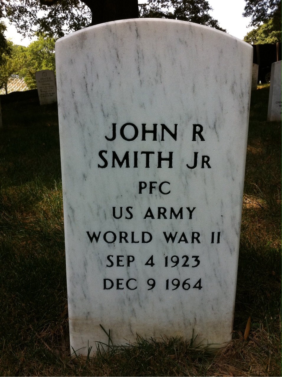 Headstone shared by 2 interments, including John R Smith Jr.