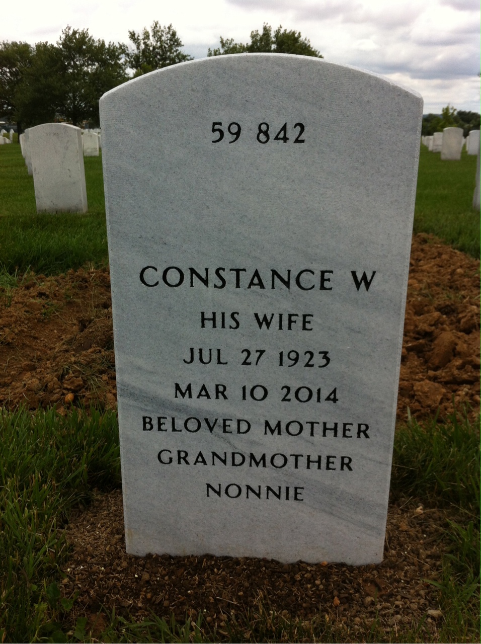 Headstone shared by 2 interments, including Frank B Robbins Jr.