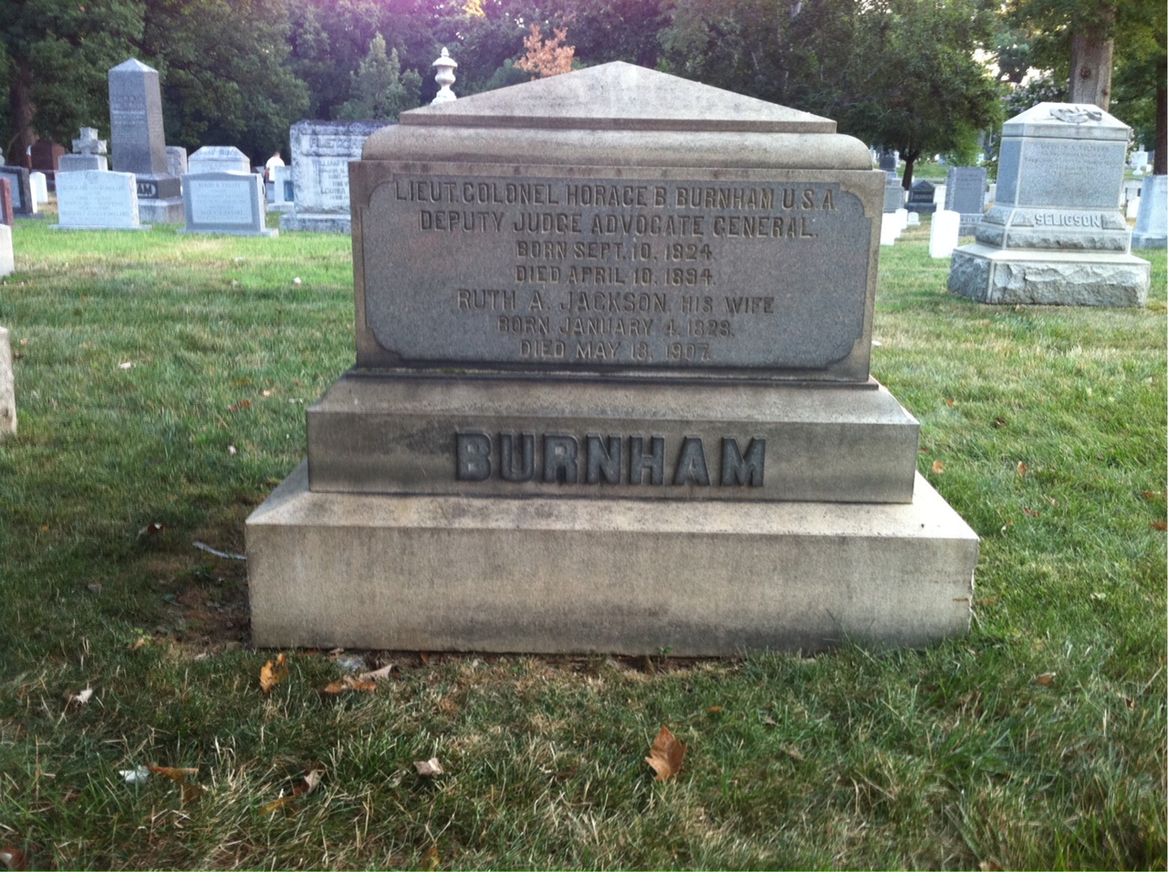 Headstone shared by 2 interments, including Horace B Burnham