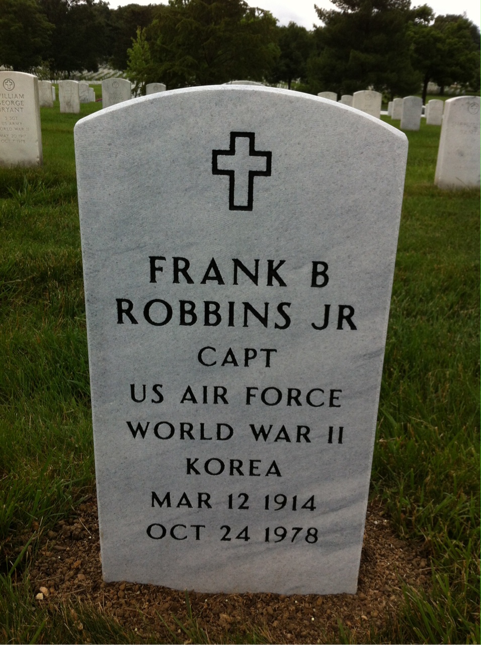Headstone shared by 2 interments, including Frank B Robbins Jr.