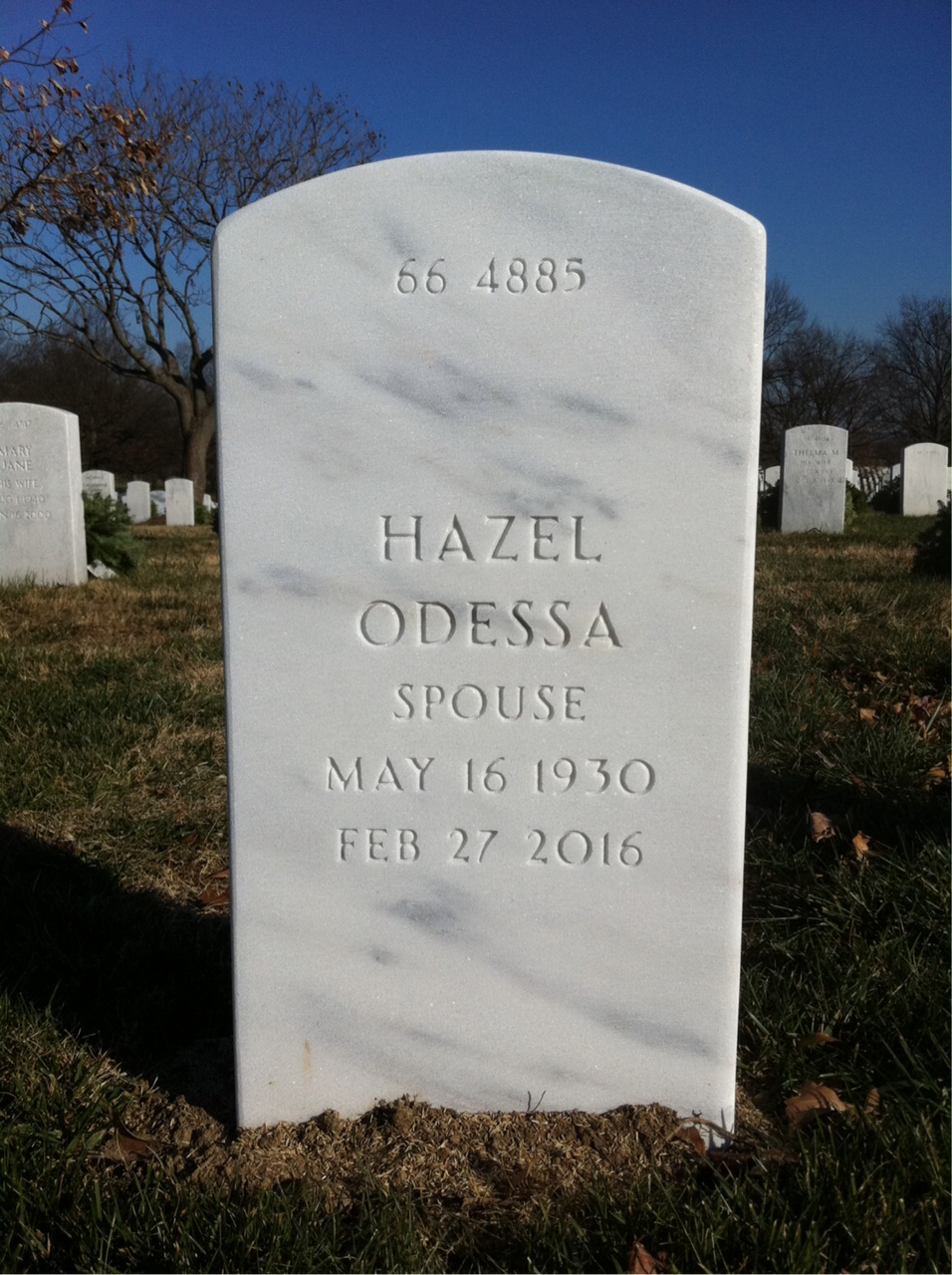 Headstone shared by 2 interments, including Tom Rhodes