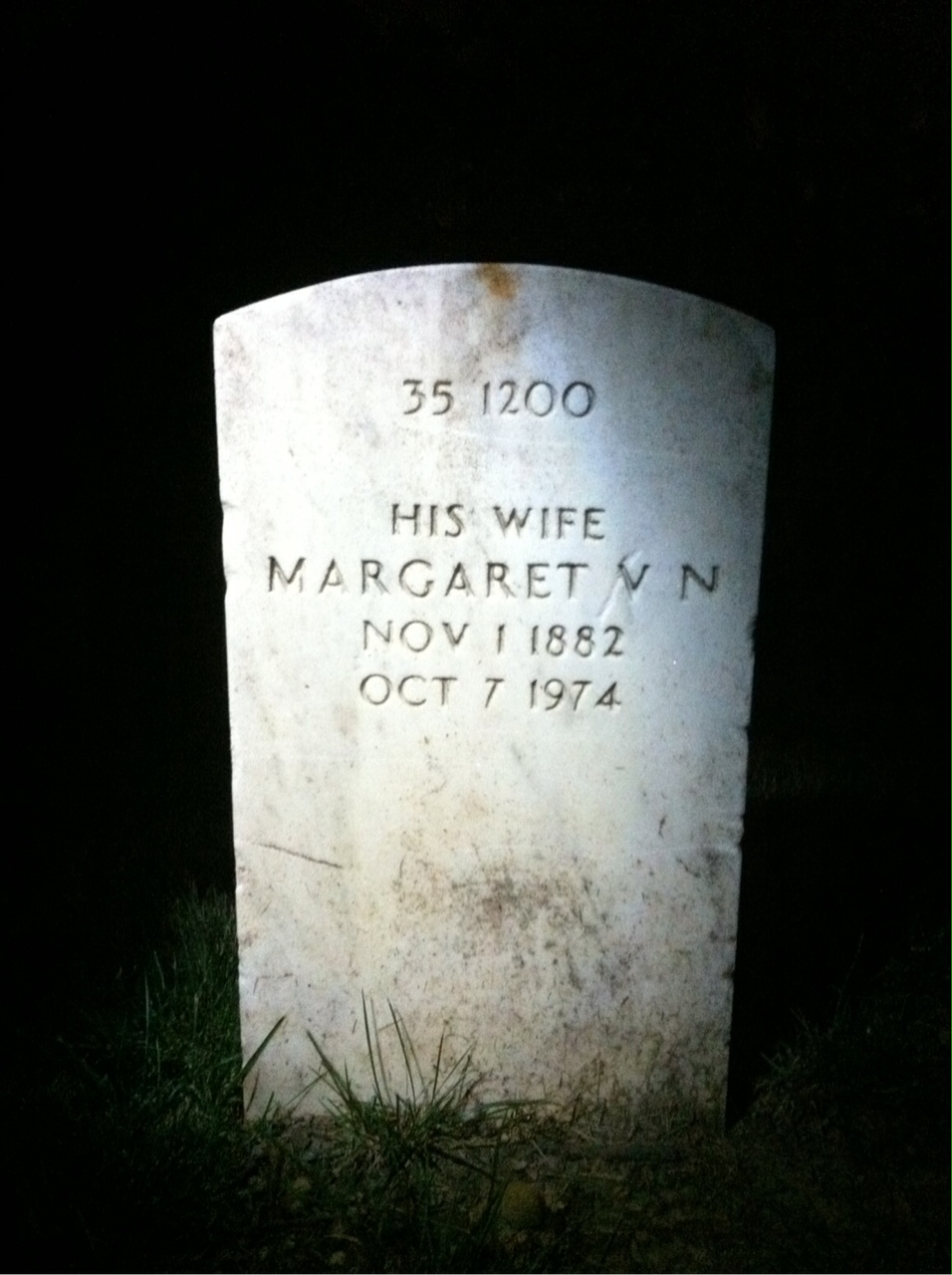 Headstone shared by 2 interments, including Orton B Stauffer