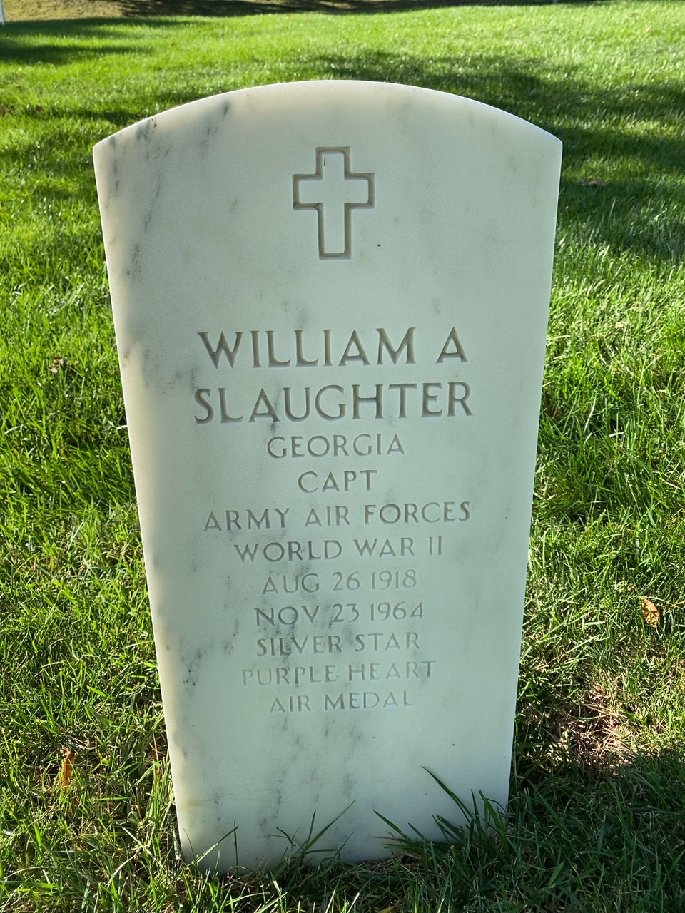 Headstone shared by 2 interments, including William A Slaughter