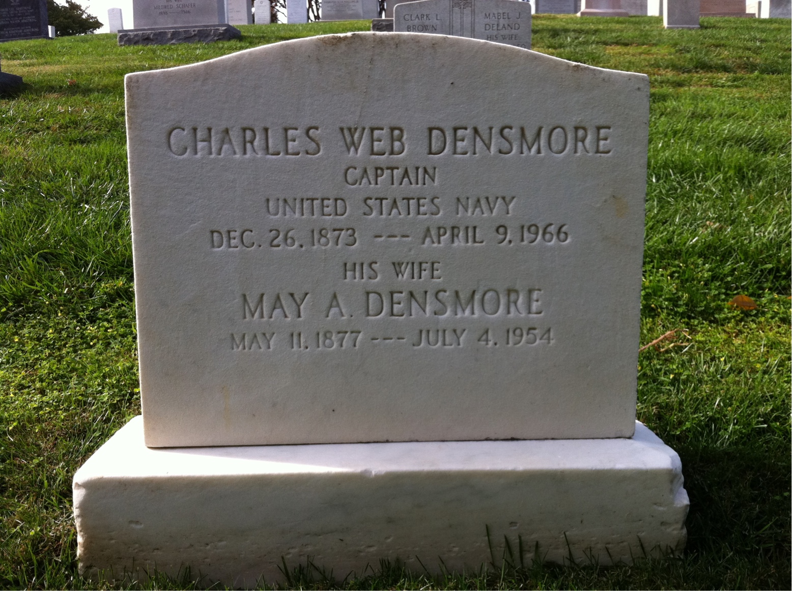 Headstone shared by 2 interments, including Charles W Densmore