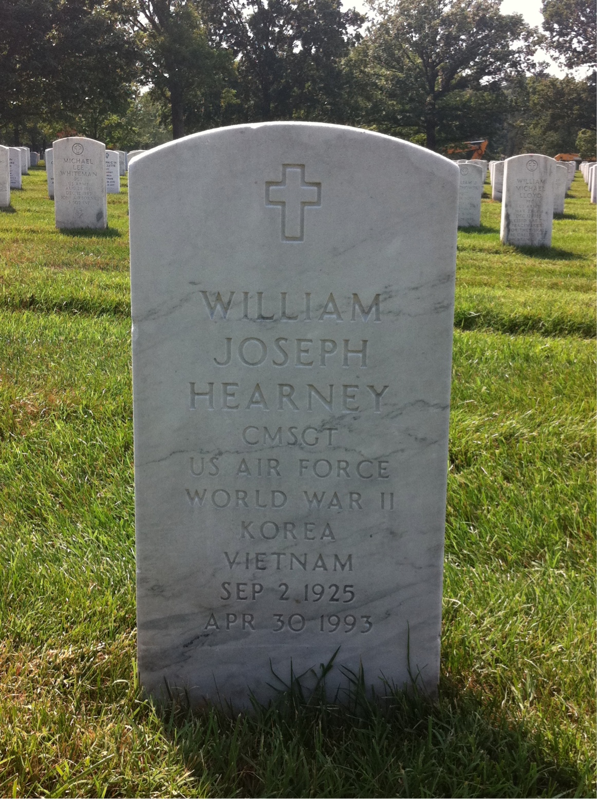 Headstone shared by 2 interments, including William J Hearney