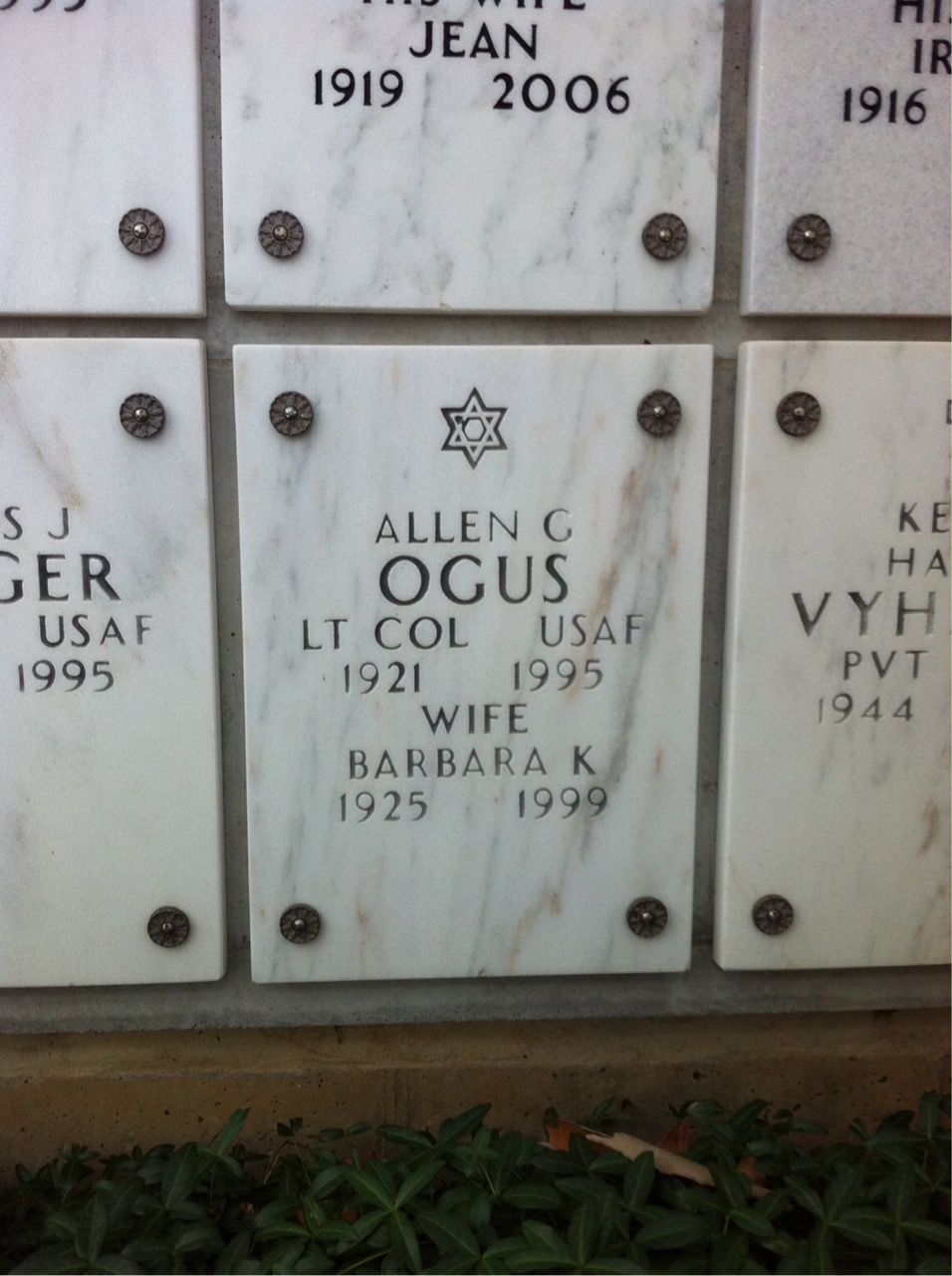 Headstone shared by 2 interments, including Allen G Ogus