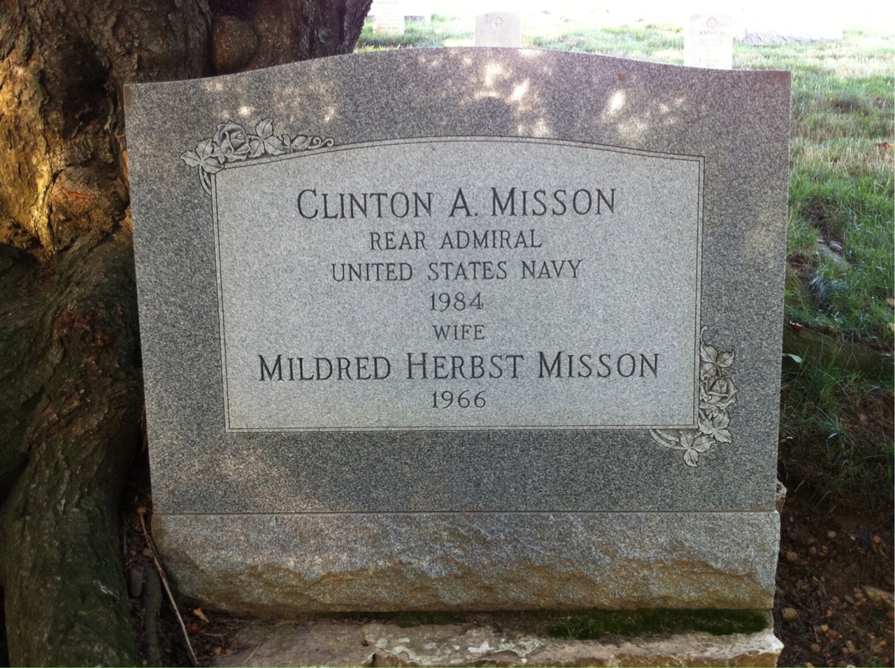 Headstone shared by 2 interments, including Clinton A Misson