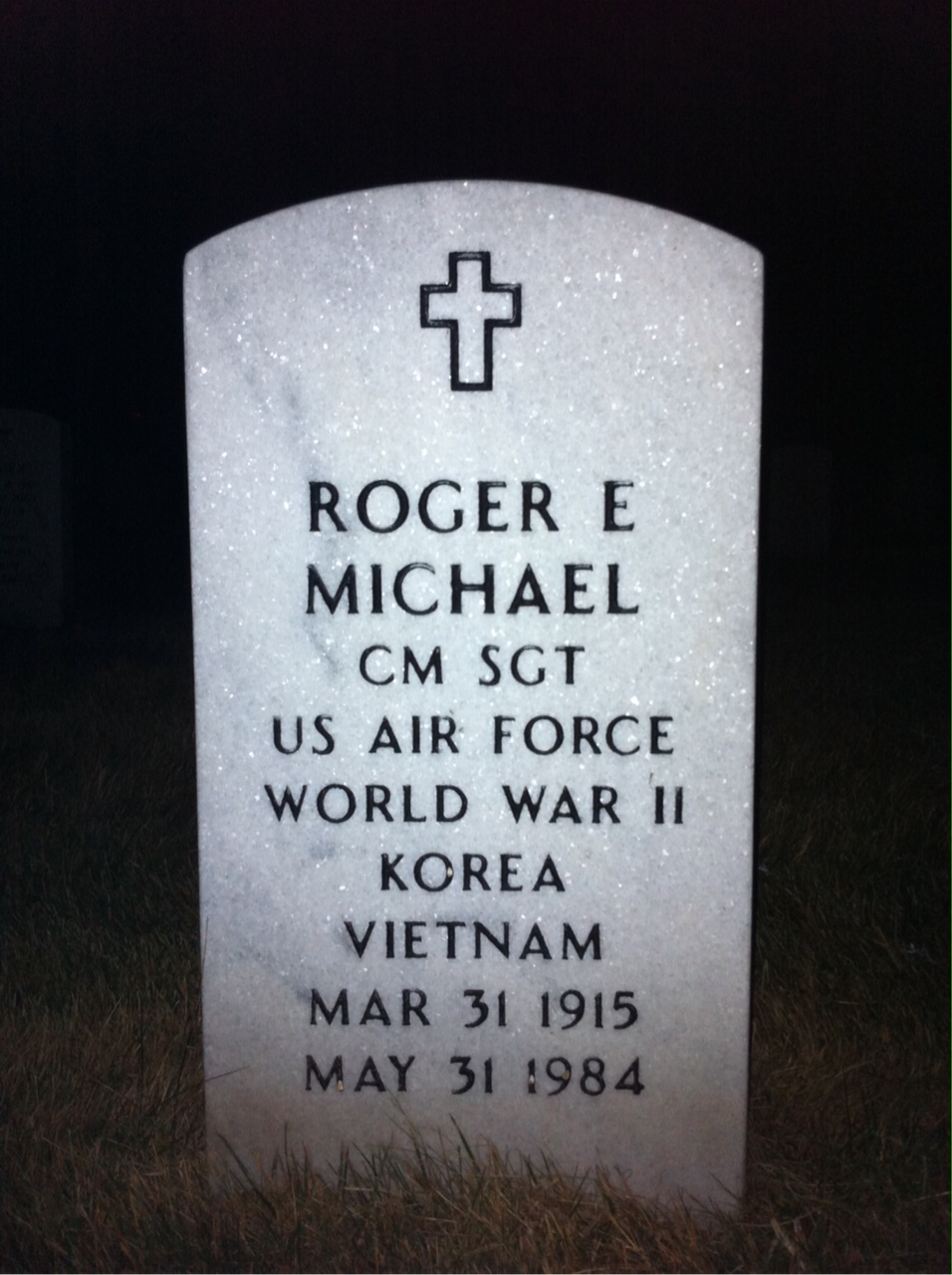 Headstone shared by 2 interments, including Roger Eugene Michael