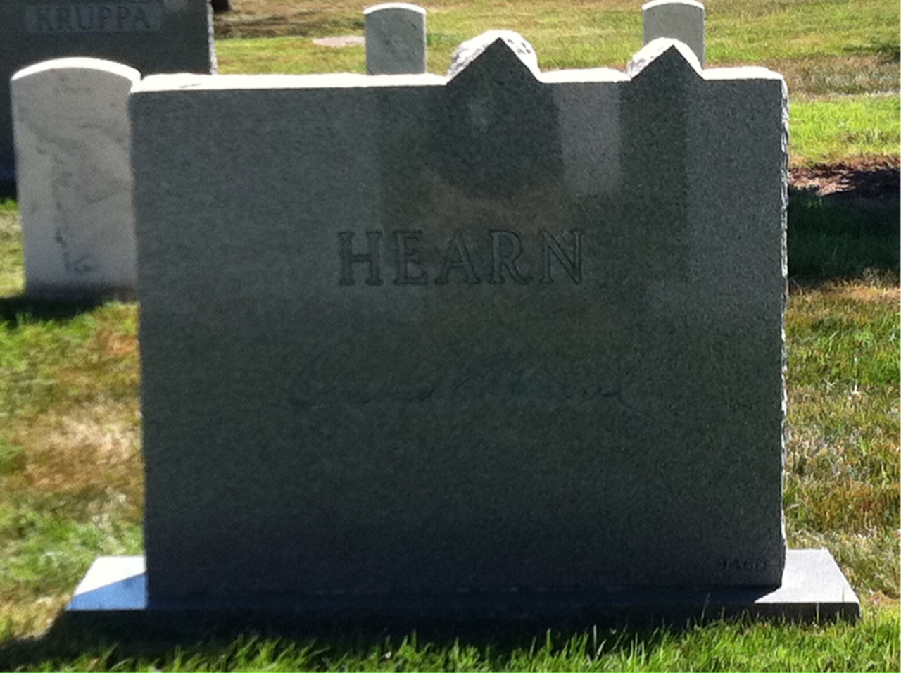 Headstone shared by 2 interments, including Ormond E Hearn Sr.