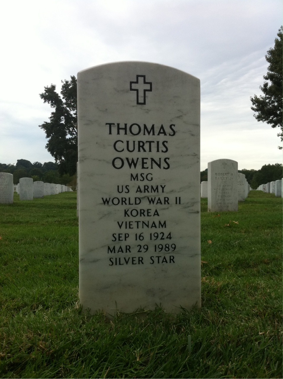 Headstone shared by 2 interments, including Thomas Curtis Owens