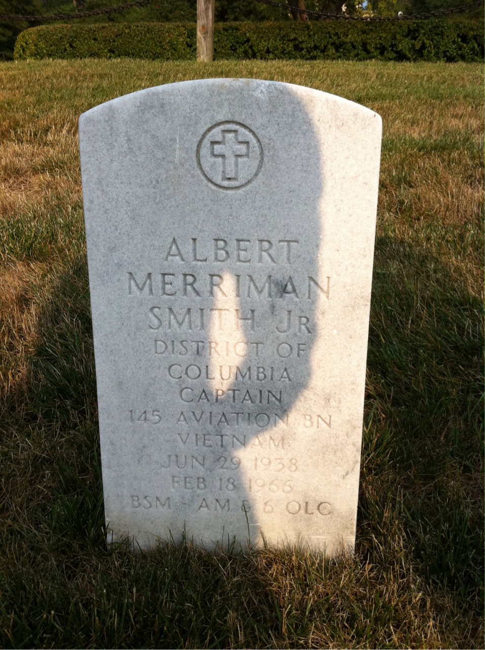 Headstone shared by 3 interments, including Albert Merriman Smith Jr.